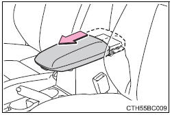 Al utilizar la tapa de la caja de la consola como reposabrazos