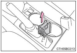 Extracción de la inserción del portabebidas